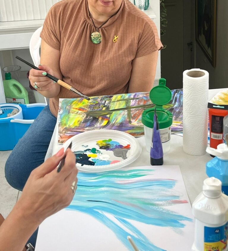 Person Painting with Brushes and Acrylics